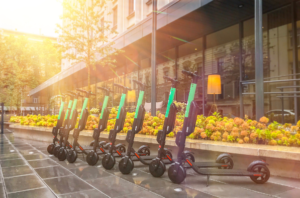 Electric scooters lined up, representing the rise of micro-mobility solutions